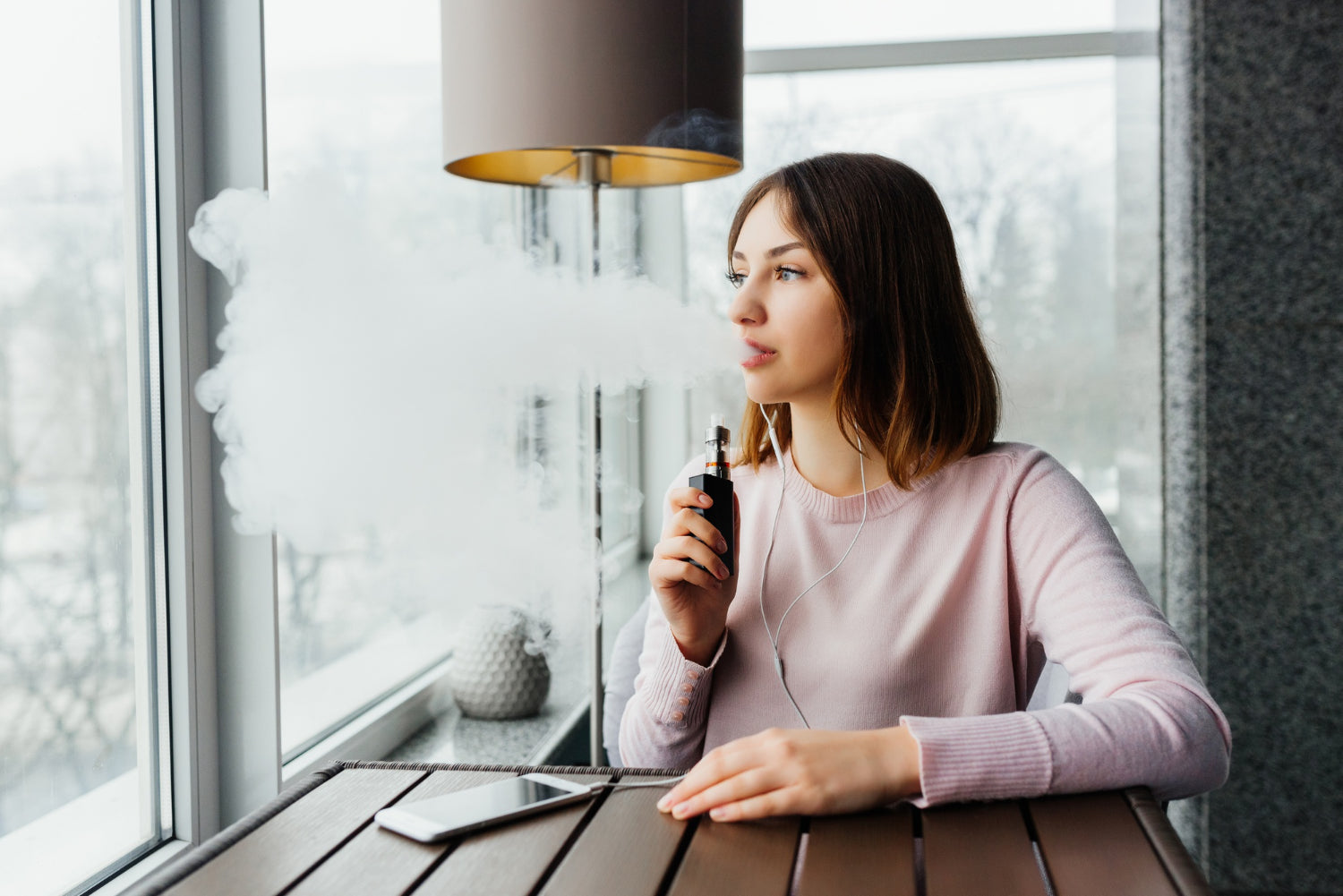 woman using vape